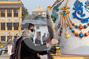 Pilgrim at Boudhanath Stupa in Kathmandu, Nepal