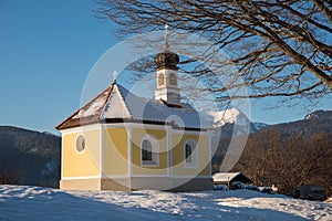 Pilgrimage chapel Maria Rast Buckelwiesen , sunny winter landscape