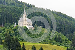 Pilgrimage Church Saint Leonhard surrounded by the forest, Tamsweg, Austria