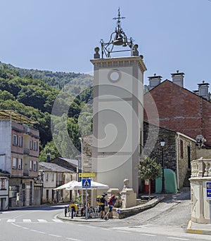 Pilgrims drinking water from the public fountain during the pilgrimage in the Camino de Santiago, Spain.