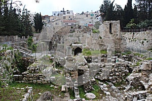 Pilgrims in The Pool of Bethesda in the Muslim Quarter of Jerusalem