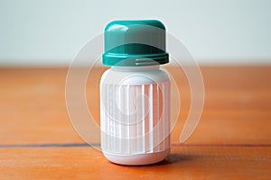 pill bottle with a childproof cap unscrewed