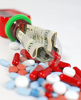 Pill Bottle with Dollars