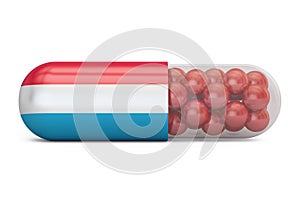 Pill capsule with Luxembourg flag, 3D rendering