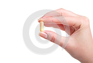 Pill in a hand