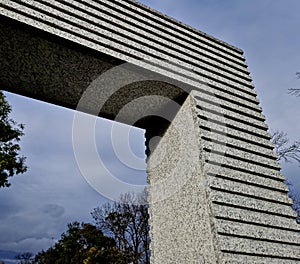 the pillar of the gate to the garden is a large stone-faced arch with