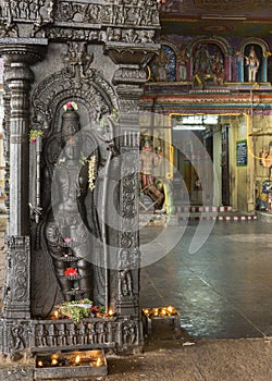 PIllar of Rama with inner sanctum entrance in background.