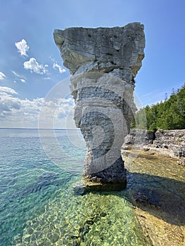Pillar rock rise from the waters of Georgian Bay on Flowerpot island in Fathom Five National Marine Park