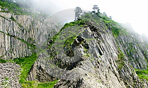 Pillar Rocks of Stolbchatiy cape in Kunashir at Kuril islands, Russia