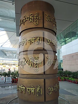 pillar with sanskrit quotes