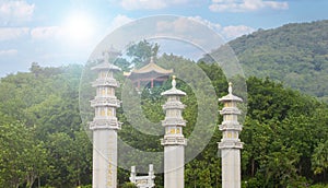 Pillars at a Buddhist temple Nanshan on soft sunlight, Sanya, China