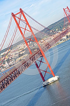 pillars of the 25 de Abril suspension bridge or Salazar bridge with inclined framing.Almada-Portugal. photo