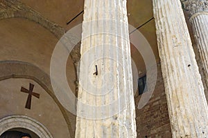 Pillars of the old Roman temple of Minerva and church of Santa Maria sopra Minerva, Assisi, Umbria, Italy