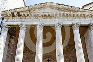 Pillars of the old Roman temple of Minerva and church of Santa Maria sopra Minerva, Assisi, Umbria, Italy