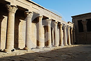 Pillars, reliefs and statue at the Edfu Temple. Nubia, Egypt