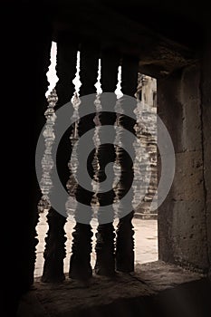 Pillars in window within Angkor Wat temple, Cambodia