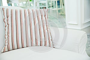 Pillow on white sofa in living room ,Vintage stlye photo