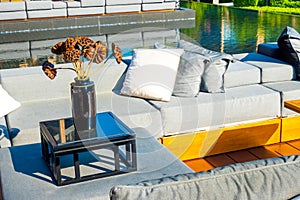 pillows with outdoor patio deck and sofa