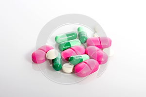 Pills or antibiotic on a white background photo