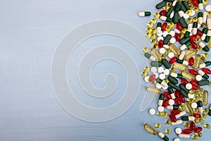 Pills background. Heap of assorted various medicine tablets and