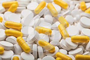 Pills background, Yellow and white medicines, health concept