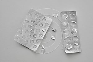 Pills blister pack on a gray background