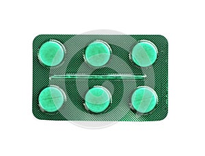 Pills in blister pack on white background, top view