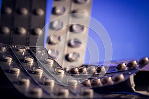 Pills on a blue background