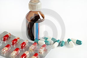 Pills and brown cure bottle photo