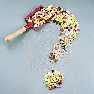 Pills Or Capsules As A Question Mark On White Isolated Background. Healthycare concept