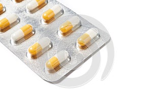 Pills capsules in container of medicament