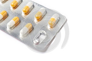 Pills capsules in container of medicament