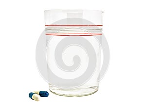 Pills Capsules medicine and glass