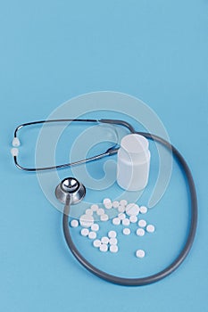 Pills Doctor medical tools phonendoscope. Medicine blue background. Doctor's tools