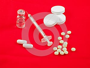 Pills, drugs caplets and syringe