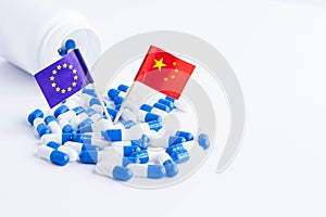 Pills with european union and china flag. Import of tablets to China.