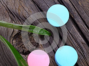 Pills and green leaf alternative therapy