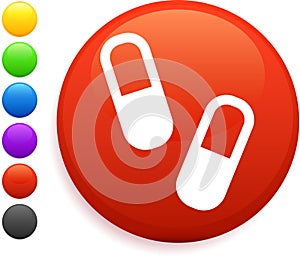 Pills icon on round internet button