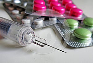 Pills and injection medicaments macro photo