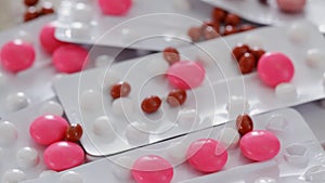 Pills and medications closeup rotating