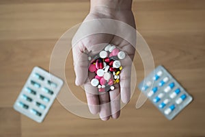 Pills and medicines in the hand pharmaceutical medicine pharmacy