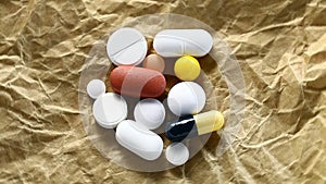 Pills, medicines are piled up and rotation counterclockwise, turning, top view.