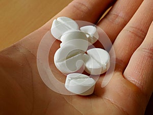 Pills on men palm