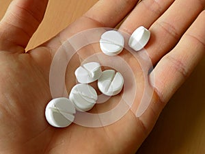 Pills on men palm