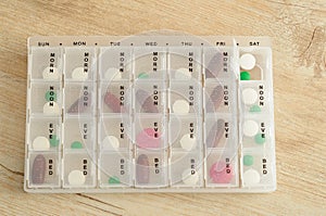 Pills organized in a pill box for daily usage