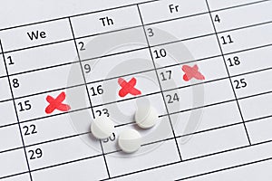 Pills for pain during PMS on the calendar