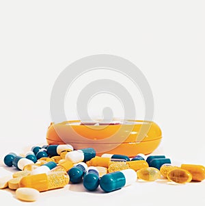 Pills in Pile on White Background