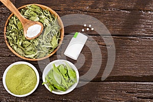 Pills, powder and leaves of stevia plant - Stevia rebaudiana. Sweetener