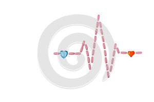Pills in shape of cardiogram pulse on white isolated background. Blue and red glass hearts, symbol of healthy lifestyle
