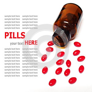 Pills spilling out of a pill bottle isolated on white background